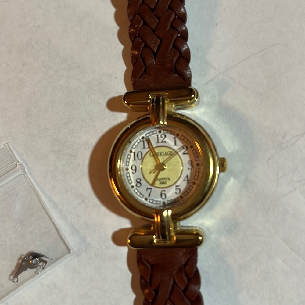 Carriage watch;needs repaired;beautiful condition otherwise,genuine leather band